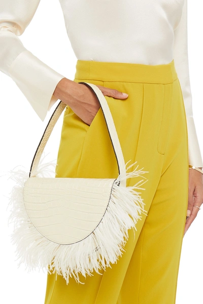 Shop Staud Amal Feather-trimmed Croc-effect Leather Shoulder Bag In Ecru