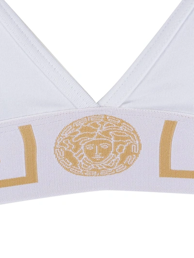 Shop Versace Greca Border Triangle Bralette In White