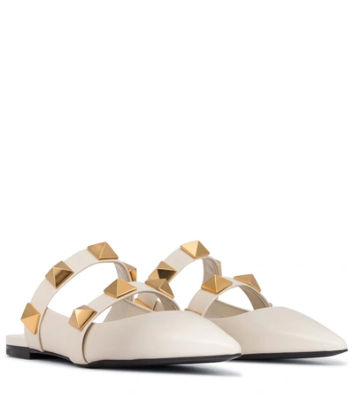 Shop Valentino Roman Stud Leather Slippers In White
