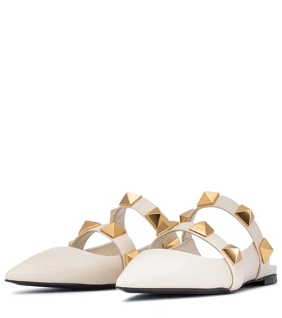 Shop Valentino Roman Stud Leather Slippers In White