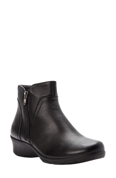 Shop Propét Waverly Wedge Bootie In Black Leather