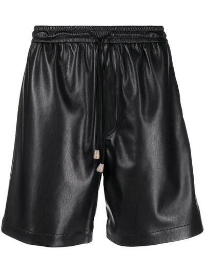 Shop Nanushka Faux-leather Drawstring-waist Shorts In Black