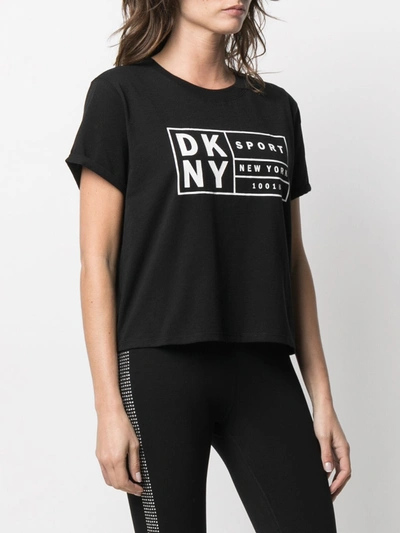 Shop Dkny Cotton T-shirt In Black