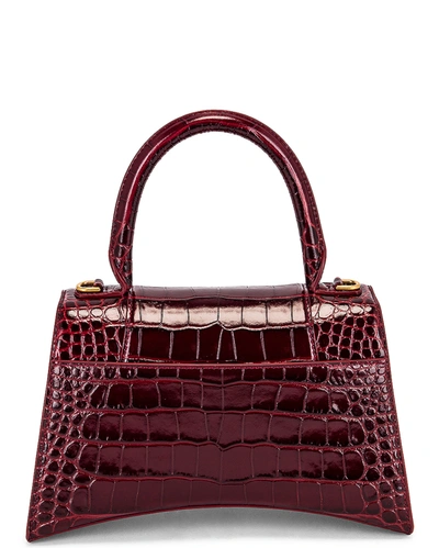 Shop Balenciaga Small Hourglass Top Handle Bag In Dark Red