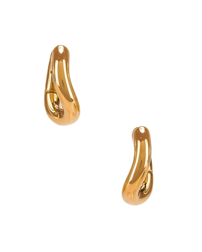 Shop Balenciaga Loop Earrings In Shiny Gold