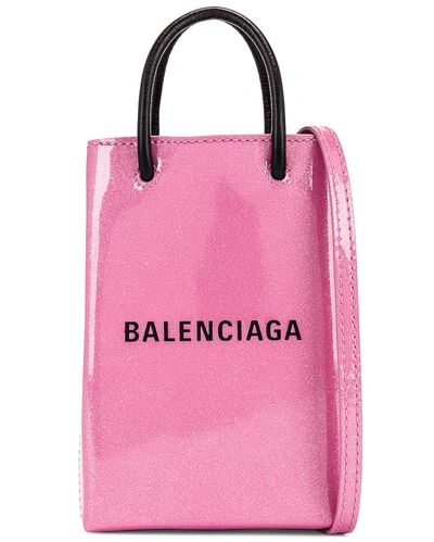 Shop Balenciaga Glitter Shopping Phone On Strap Bag In Old Rose