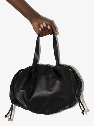 Shop Bottega Veneta The Bulb Leather Clutch In Black