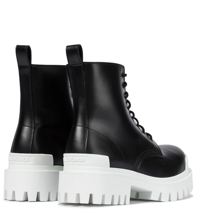 Shop Balenciaga Strike Leather Ankle Boots In Black