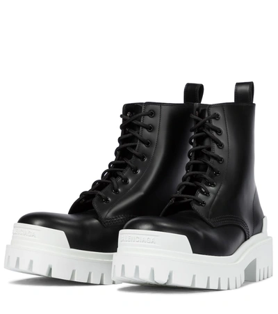 Shop Balenciaga Strike Leather Ankle Boots In Black