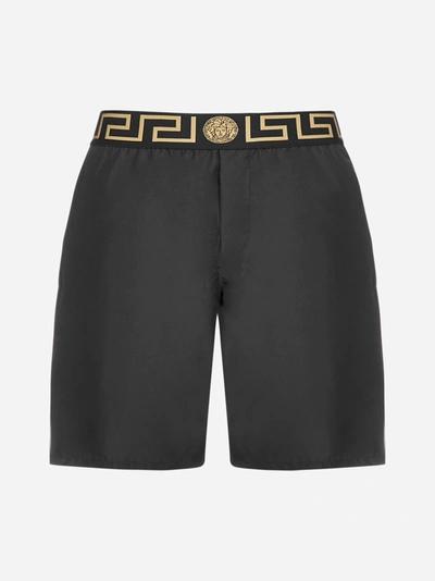 Shop Versace Medusa And Logo Swim Shorts