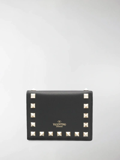 Shop Valentino Rockstud Compact Wallet In Black