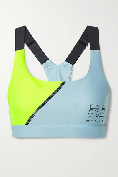 Shop P.e Nation Twist Serve Printed Color-block Stretch Sports Bra In Light Blue