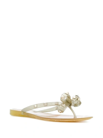 Shop Valentino Rockstud Thong In Gold