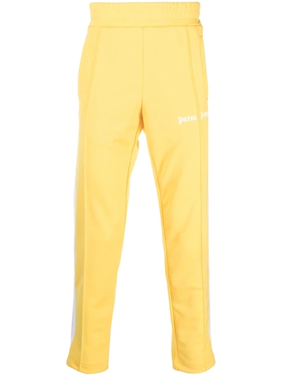 Shop Palm Angels Striped Tape Track Pants In Yellow