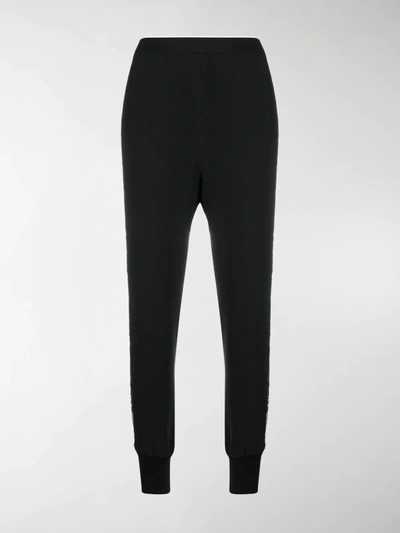Shop Stella Mccartney Lace Cut-out Tapered Trousers In Black