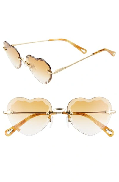 Shop Chloé Rosie 55mm Heart Shaped Sunglasses In Gradient Wine/ Gold