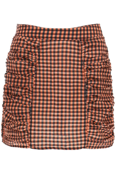 Shop Ganni Seersucker Check Mini Skirt In Flame (black)