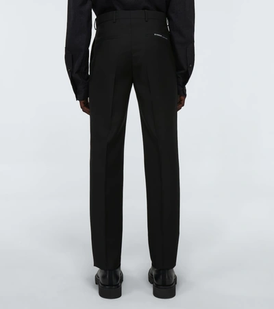 Shop Givenchy Tailored Wool Pants In Black