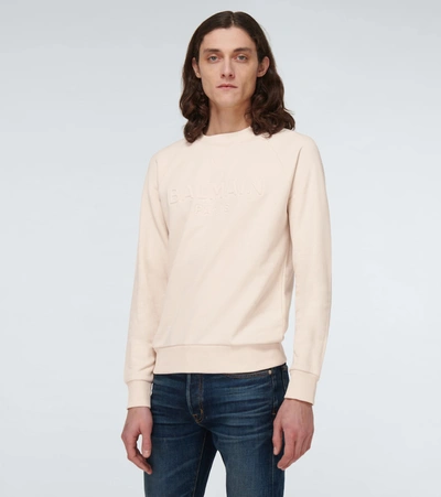 Shop Balmain Logo Embossed Cotton Sweatshirt In Beige