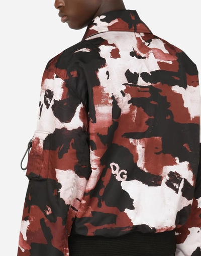 Shop Dolce & Gabbana Camouflage-print Nylon Jacket With Multiple Logos In Multicolor