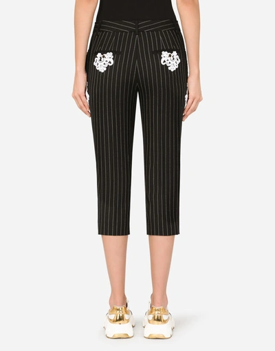 Shop Dolce & Gabbana Pinstripe Wool Pants With Macramé Embellishment In Multicolor