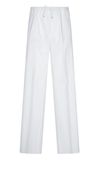 Shop Valentino Pants In White