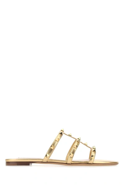 Shop Valentino Garavani Rockstud Sandalia Sandals In Gold