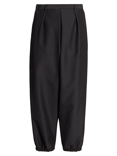 Shop Saint Laurent Wool-mohair Pleat-front Trousers In Noir