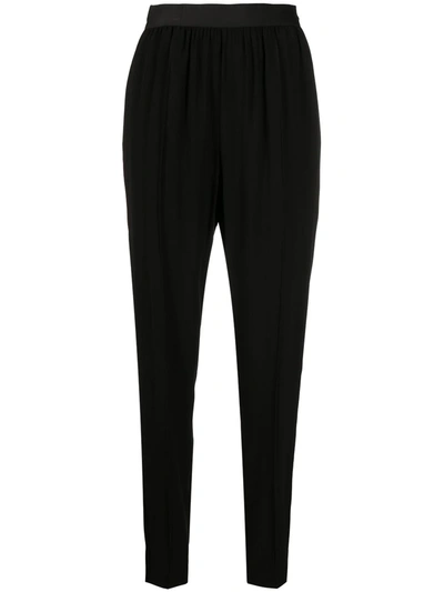 Shop Maison Margiela Elasticated Waistband Tapered Trousers In Black