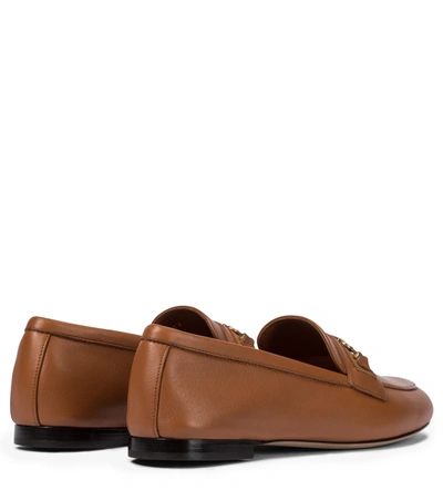 Shop Ferragamo Gancini Leather Loafers In Brown