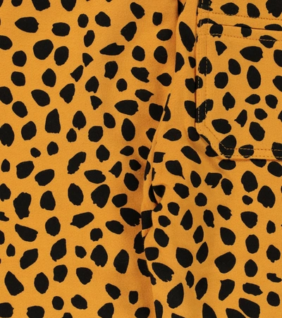 Stella Mccartney Cheetah-print Organic-cotton Track Trousers In Orange