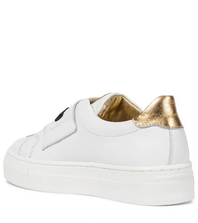 Shop Moschino Leather Sneakers In White