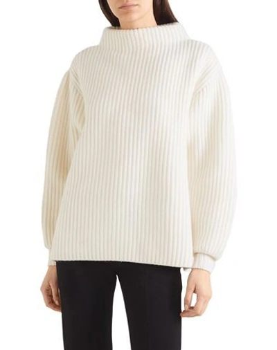 Shop Alaïa Turtlenecks In Ivory