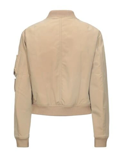 Shop Burberry Jackets In Sand