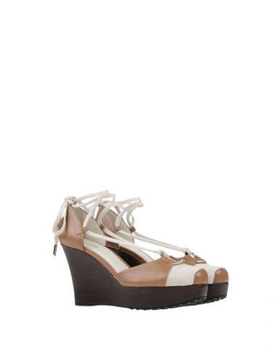 Shop Tod's Sandals In Ivory