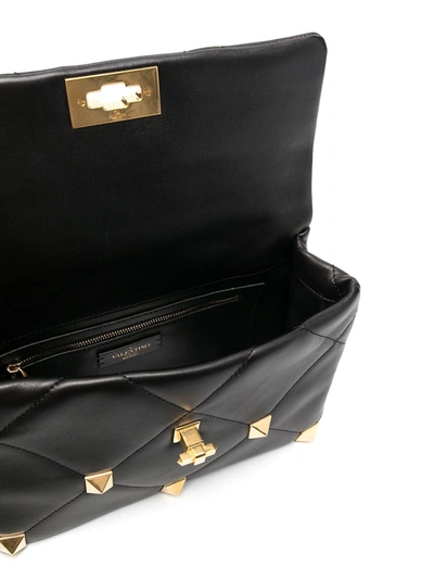 Shop Valentino Large Roman Stud Shoulder Bag In Black