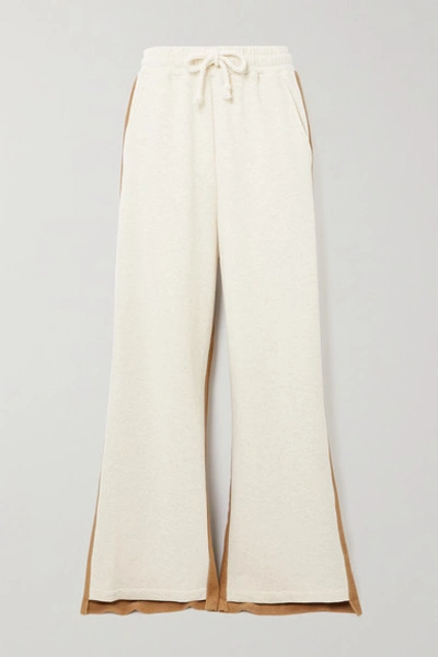 Shop Jw Anderson Paneled Cotton-terry And Jersey Track Pants In Beige