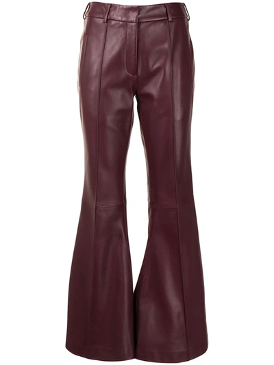 Shop Khaite Flared Leather Trousers In Red