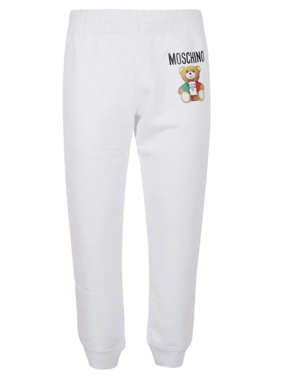 Shop Moschino Pants In Fantasia Bianco