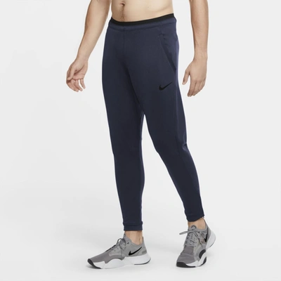 Shop Nike Men's  Pro Fleece Pants In Blue