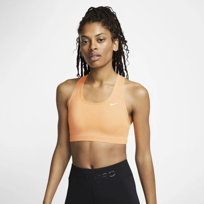 Shop Nike Dri-fit Swoosh Women's Medium-support Non-padded Sports Bra In Orange Chalk,white