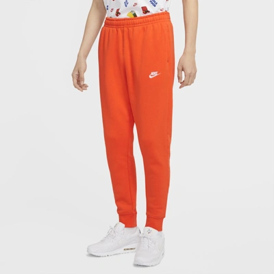 Shop Nike Sportswear Club Fleece Joggers In Electro Orange,electro Orange,white