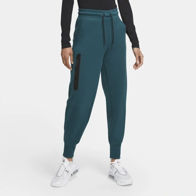 Shop Nike Women's  Sportswear Tech Fleece Pants In Green