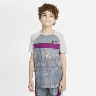 Shop Nike Dominate Big Kids' Short-sleeve Printed Training Top In Light Smoke Grey,viotech,black