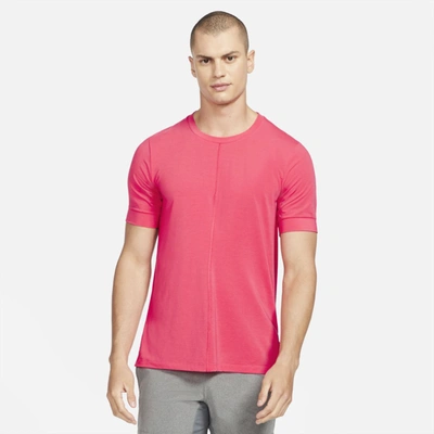 Shop Nike Yoga Dri-fit Men's Short-sleeve Top In Light Fusion Red,black