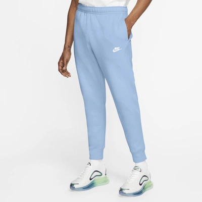 Shop Nike Sportswear Club Fleece Joggers In Psychic Blue,psychic Blue,white