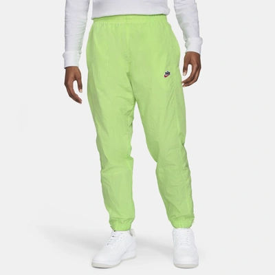 Shop Nike Sportswear Heritage Windrunner Men's Woven Pants In Key Lime