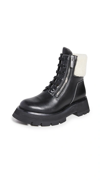 Shop 3.1 Phillip Lim / フィリップ リム Kate Lug Sole Double Zip Shearling Boots In Black