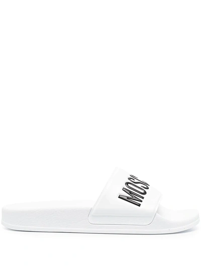 Moschino Embossed Logo Pool Slides In White