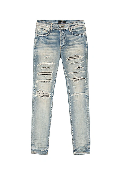 Shop Amiri Bandana Thrash Jean In Clay Indigo